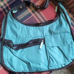 Thirty-one Explorista teal cross-body purse